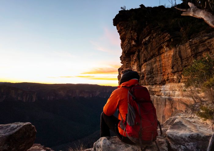 Man enjoying views of the sunset near Hanging Rock, Blackheath