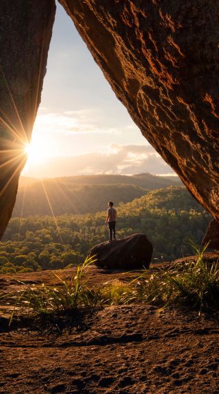 Man enjoying a scenic walk, Dandahra Crags walking track, Gibraltar Range National Park, Gibraltar Range
