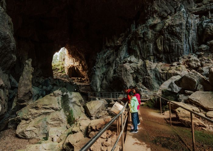 Victoria Arch at Wombeyan Karst Conservation Reserve, Wombeyan Caves - Credit: Remy Brand Family walking in the Victoria Arch accessible platform at Wombeyan Karst Conservation Reserve, Wombeyan Caves